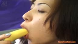 Licking her vibrator